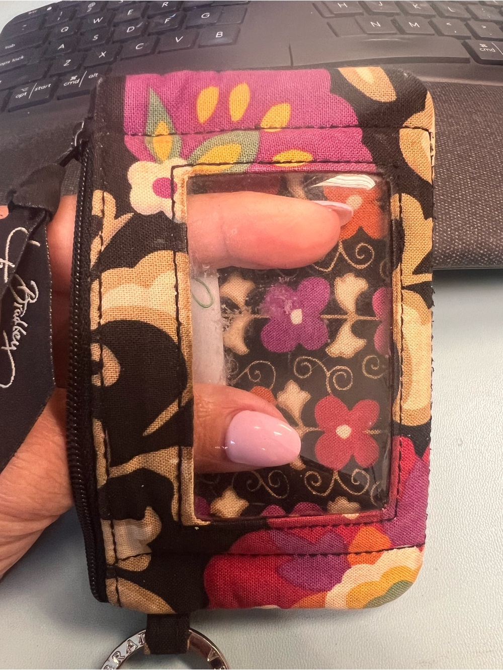 Zip ID case is featured in the retired “Suzani”pattern with floral design. - Picture 4 of 5